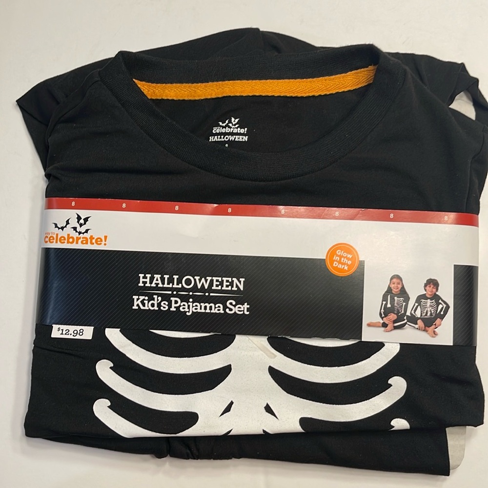 Kids size 8  Glow in the dark Halloween Pajamas.
